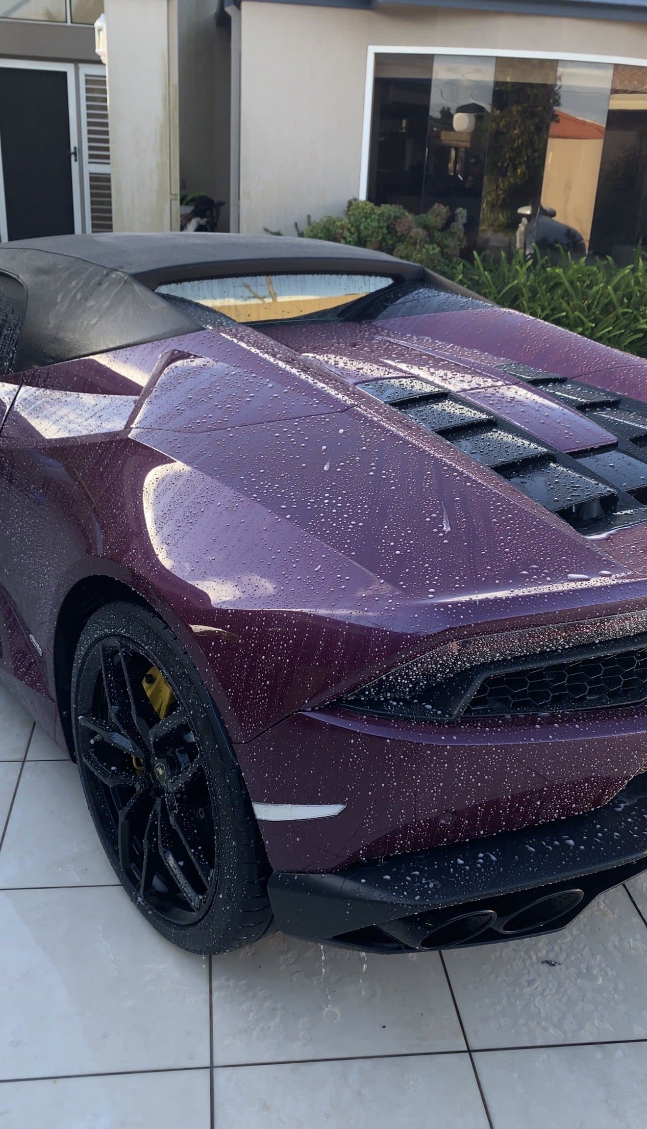 Water beading on a hydrophobic ceramic-coated panel