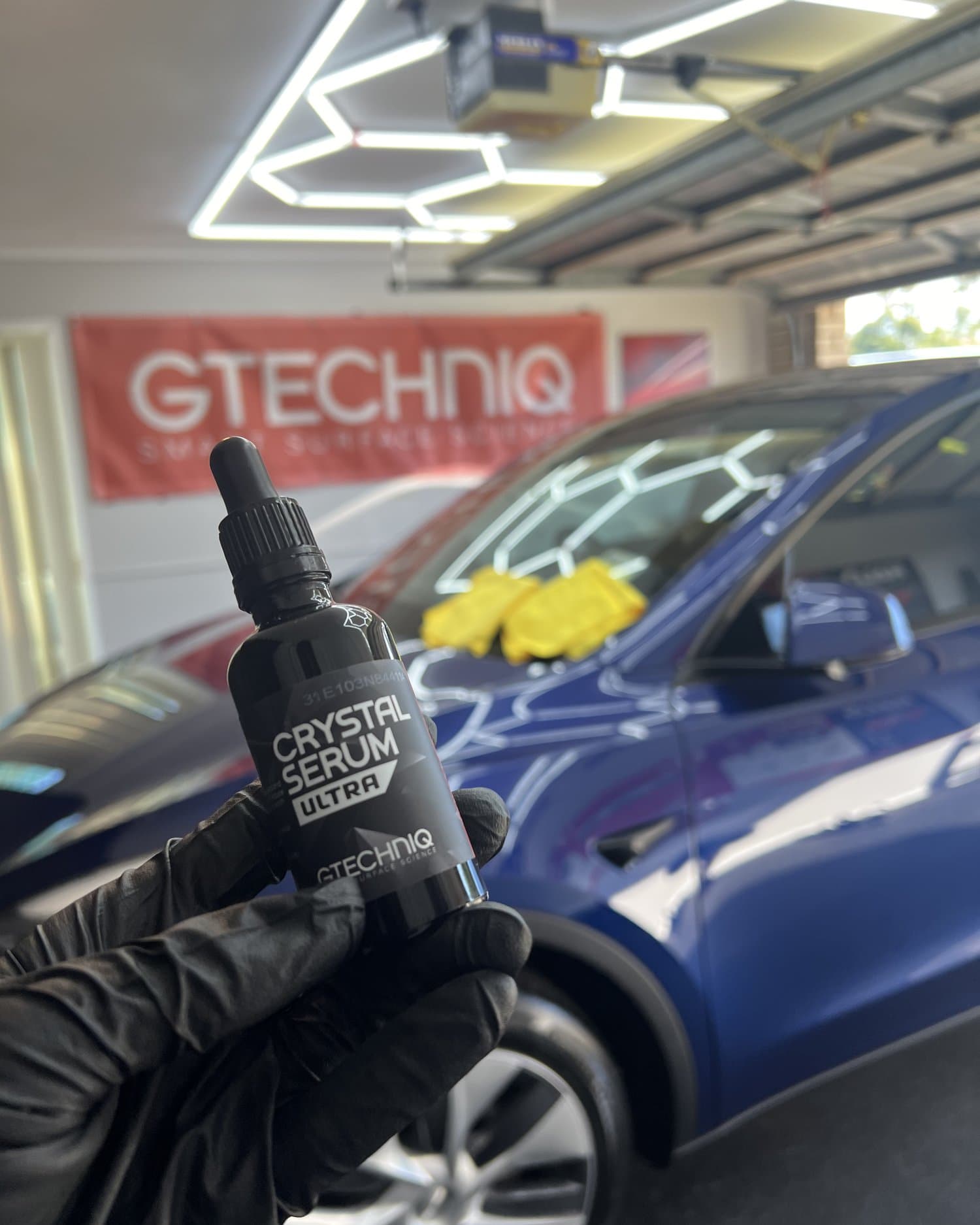 Gtechniq Crystal Serum Ultra being applied to a vehicle